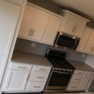 Milan, IL New Construction MSI Quartz Koch Express Cabinets White and Java