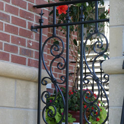 Solid stone stairs with ornamental iron railing - Products