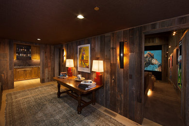 Huge mountain style open concept carpeted and brown floor home theater photo in Los Angeles with brown walls and a projector screen