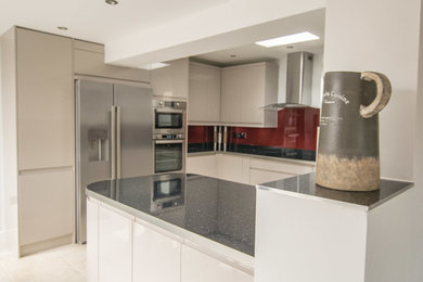 This is an example of a medium sized contemporary kitchen in Cambridgeshire.