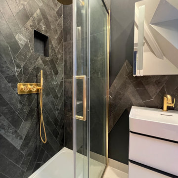 Black and gold shower room in Putney