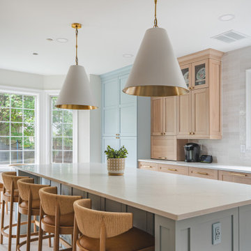 Scandinavian Kitchen with Light Oak Cabinets and Quartzite Island