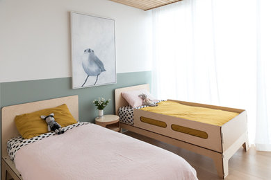 This is an example of a small contemporary kids' room for girls in Melbourne.