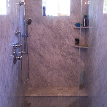 Carrara marble shower and tub