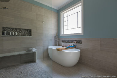 Example of a mid-sized trendy master beige tile and porcelain tile porcelain tile and beige floor bathroom design in Raleigh with shaker cabinets, dark wood cabinets, a two-piece toilet, blue walls, an undermount sink and quartz countertops