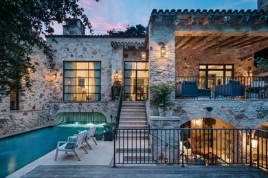 Example of a tuscan patio design in Austin