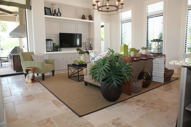 Family room - mid-sized tropical open concept travertine floor family room idea in Miami with white walls, no fireplace and a wall-mounted tv