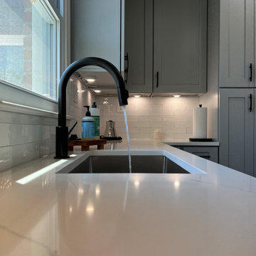 Modern Kitchen Remodeling in D.C with Grey cabinets and Quartz Countertop