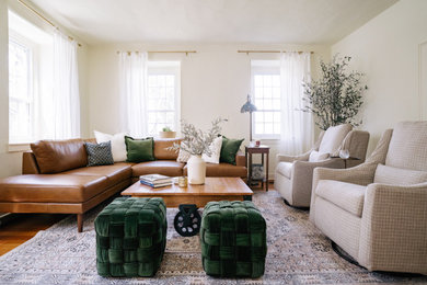 Example of a farmhouse living room design in Philadelphia