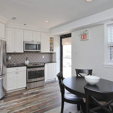 Cherry Hill, NJ: Open Office Kitchen with Diagonal Fridge and Rustic Floors