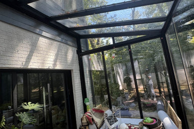 Inspiration for a modern sunroom remodel