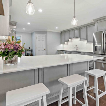 Spacious Kitchen Island with Seating and Pendant Lighting