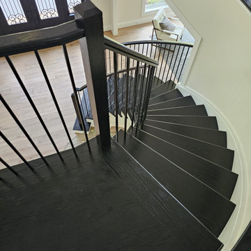 Project #130 | Curved Staircase with Wraparound Balcony