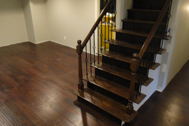 Inspiration for a transitional wooden straight staircase remodel in St Louis with wooden risers