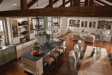 Inspiration for a large transitional l-shaped dark wood floor and beige floor open concept kitchen remodel in Boston with an undermount sink, raised-panel cabinets, beige cabinets, quartz countertops, beige backsplash and an island