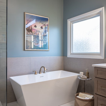 Spa Like Primary Bathroom Remodel with Warm Wood & Brass Details