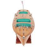 Old Modern Handicraft - Chris Craft Triple Cockpit Medium Model Display - Chris Crafts were first produced in the 1910�s as high-end powerboats. Throughout the years, Chris Craft became the synonymous boating. It is available as a FULLY ASSEMBLED model ready to be proudly displayed. Master craftsmen handcraft these highly detailed wood models from scratch using historical photographs, drawings, and original plan. They are built to scale with high-grade wood such as western red cedar, rosewood, and mahogany. They are 100% hand built individually using plank-on-frame construction method and are similar to the building of actual ships. Each model requires hundreds of hours to finish and must go through a demanding quality control process before leaving the workshop. This Chris Craft Triple Cockpit has hand stitched green leather interior. The gauges have detailed lettering to show a realistic look. All the ornaments on the ship are made out metal to make the boat really stand out. There are two flags that represent the Chris Craft heritage. This model comes with a wooden stand. It�ll make a perfect gift for home or office decorator, boat enthusiast, or passionate collector.