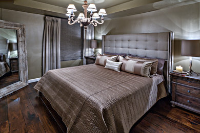 Inspiration for a mid-sized transitional master dark wood floor and brown floor bedroom remodel in Phoenix with gray walls and no fireplace