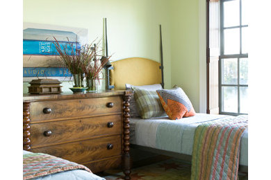 This is an example of an eclectic bedroom in DC Metro.
