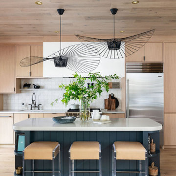 Natural Rift-Cut White Oak Modern Kitchen with Curvy Paneled Navy-Blue Island