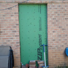 Partially bricked garage door