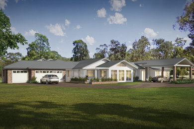 Example of a country exterior home design in Sydney