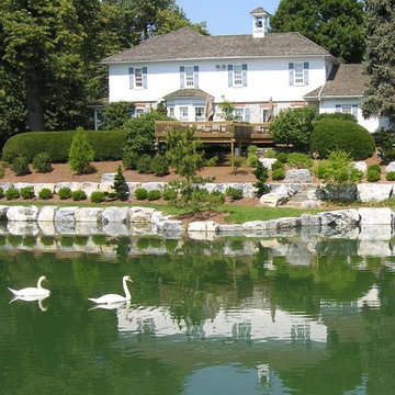 Historic Farmhouse Bank and Pond Landscape