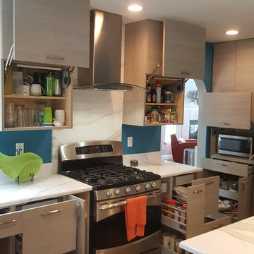 This is a two tone updated kitchen with efficient use of space & feature points