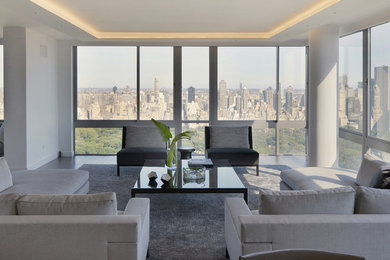 Inspiration for a modern formal and open concept medium tone wood floor living room remodel in New York with white walls