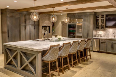 Transitional l-shaped open concept kitchen photo in Other with shaker cabinets, distressed cabinets, stone slab backsplash, stainless steel appliances and an island