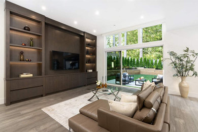 Example of a trendy family room design in Vancouver