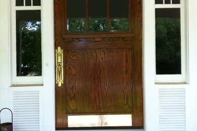 Arts and crafts entryway photo in Dallas