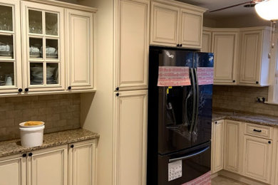Kitchen - french country kitchen idea in New York