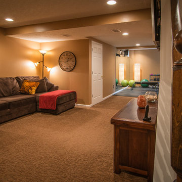 Finished basement with exercise area and small bath in Wexford, PA