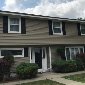 Deer Park Siding - Tuscan Clay Dutch Lap Siding with Charcoal Roof & Windows