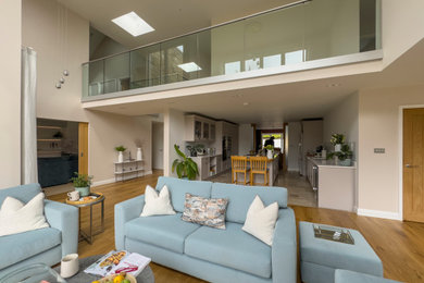 Expansive contemporary open plan living room in Other.