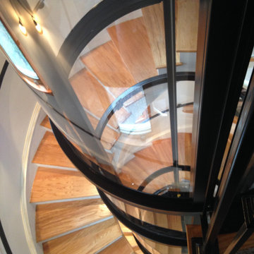 Round Acrylic Home Elevator Incorporated into Staircase
