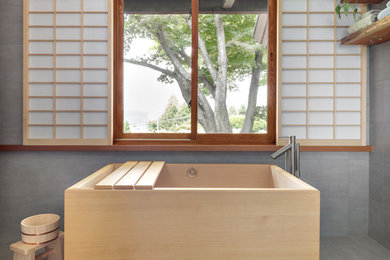Example of a zen bathroom design in New York