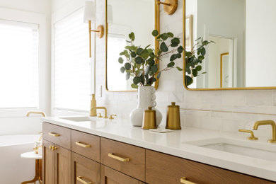 Mid-sized transitional master marble tile ceramic tile, gray floor and double-sink bathroom photo in Boise with shaker cabinets, a one-piece toilet, white walls, an undermount sink, quartz countertops, a hinged shower door, white countertops and a built-in vanity