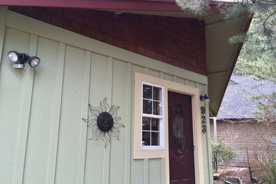 Example of an eclectic exterior home design in Other