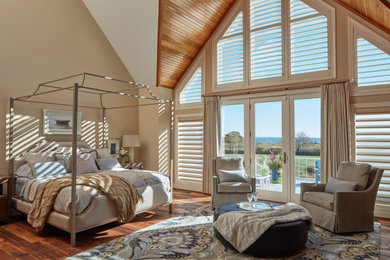 Bedroom - large contemporary master dark wood floor and brown floor bedroom idea in Baltimore with beige walls
