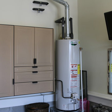 Deep, single wide garage features work bench and exercise area