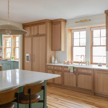 Warm Modern Kitchen Renovation with Natural Oak & Green Accents