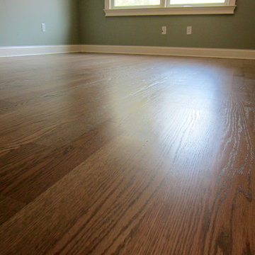 NISSEQUOGUE:  2 1/4" RED OAK W/ CUSTOM GREY BLEND STAIN + BONA TRAFFIC HD SATIN