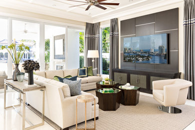 Design ideas for an expansive transitional family room in Miami.