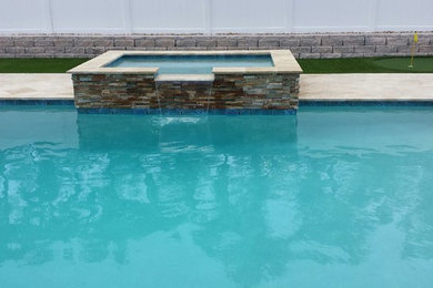 Photo of a modern pool in Miami.