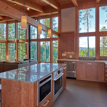 Another view of the kitchen with microwave and oven built in to the island.