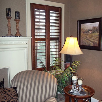 Stained Shutters on White Casement Windows