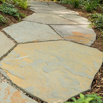 Summit Homeowner Overcomes Sloping Property