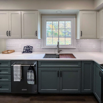 Custom Two-Toned Green and White Kitchen with Laventa Carrara Quartz Countertops